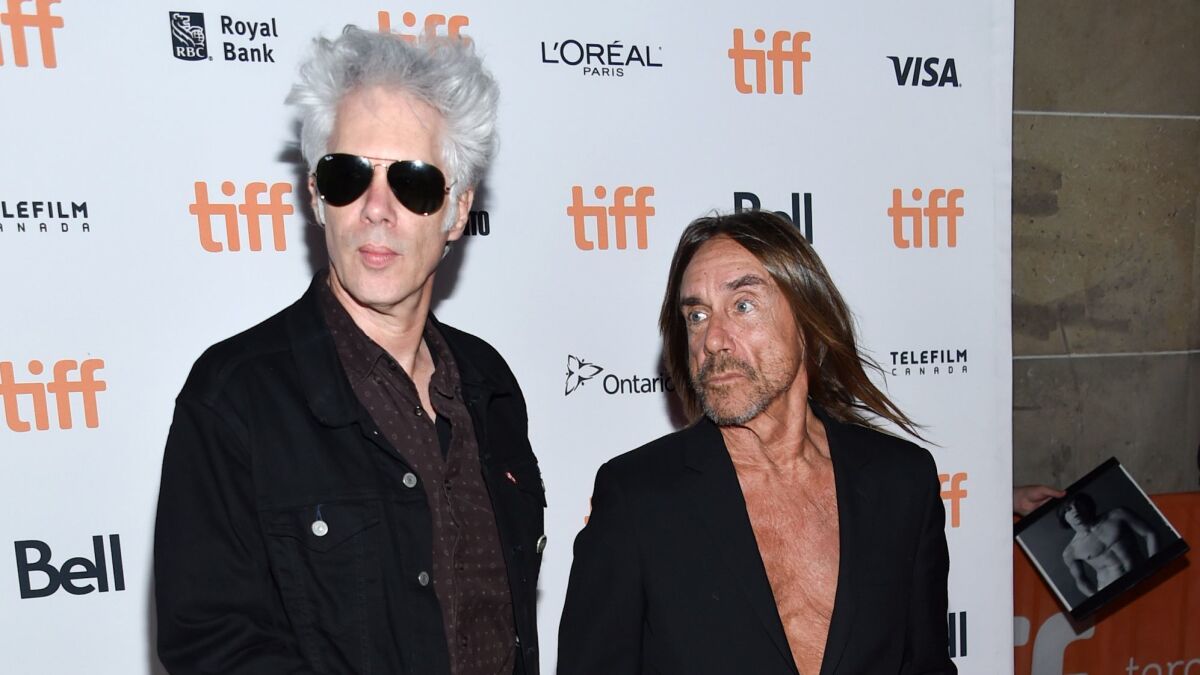Director Jim Jarmusch, left, and singer Iggy Pop attend the "Gimme Danger" premiere at the Toronto International Film Festival on Sept. 14.