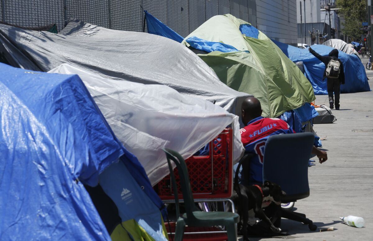 Proposition HHH is a bond measure that would raise up to $1.2 billion to help pay for housing for chronically homeless people. Above, an encampment in downtown Los Angeles.
