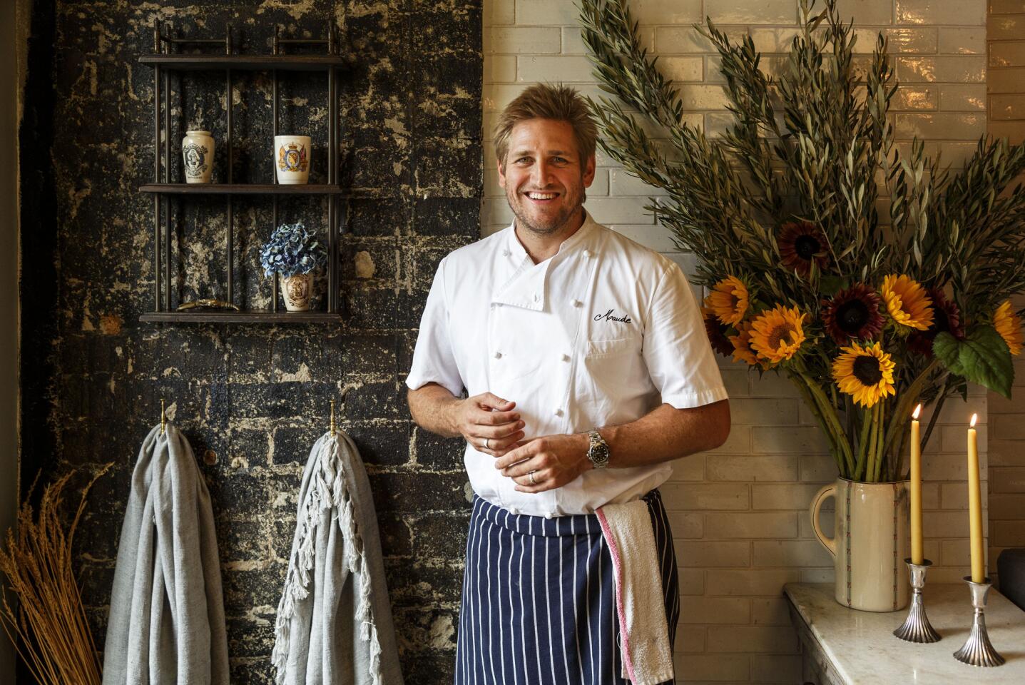Celebrity chef Curtis Stone is shown at Maude, his first restaurant, located in Beverly Hills.