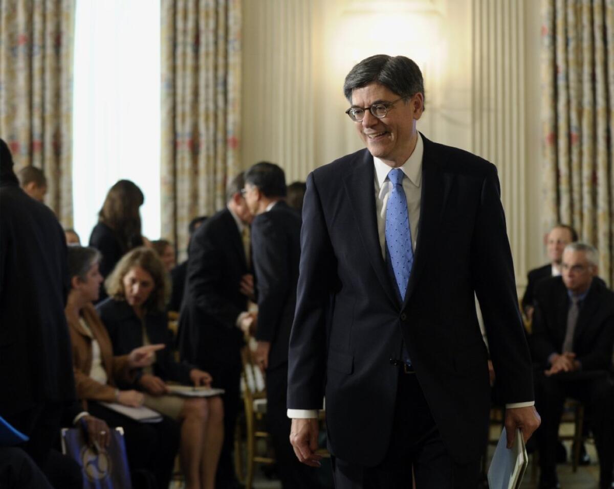 Treasury Secretary Jacob Lew arrives at the White House for President Obama's remarks on technology.