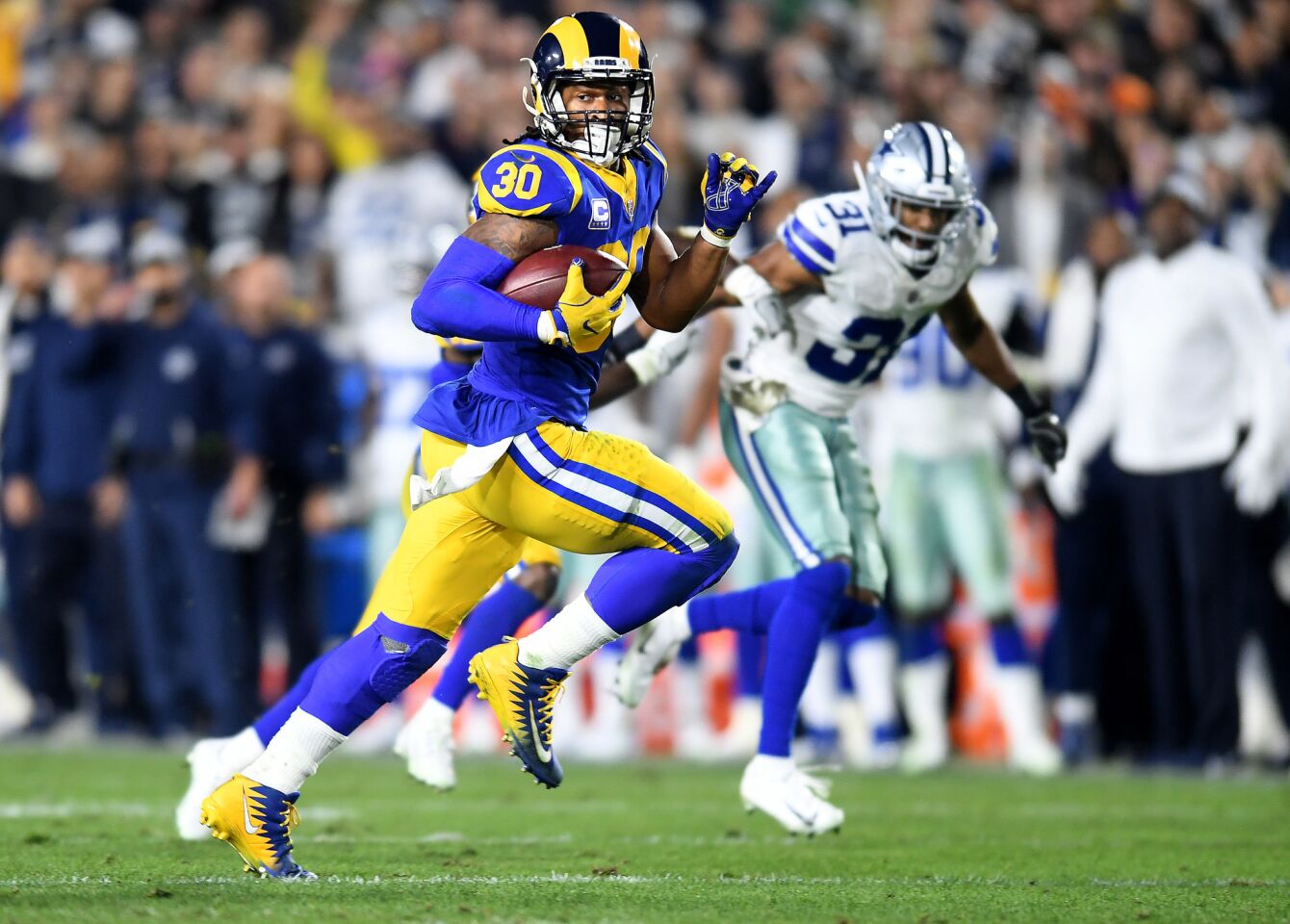 Rams running back Todd Gurley beats Dallas Cowboys cornerback Byron Jones for a 35-yard touchdown during the second quarter.