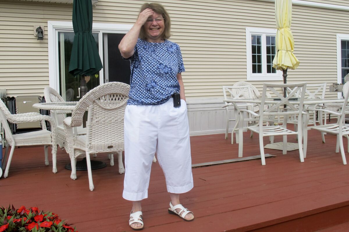  Jean Grady smiles at her home in Westford, Vt. Grady wears an insulin pump to help manage her diabetes. 