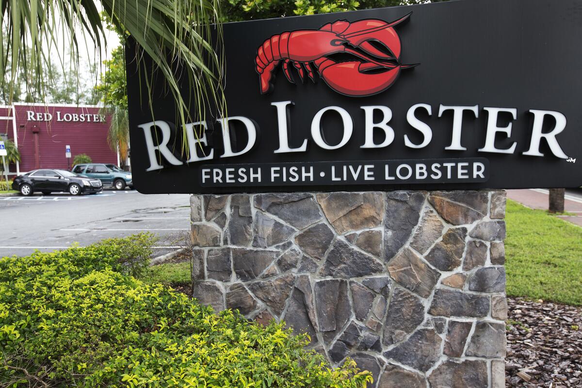 A sign is shown for a Red Lobster restaurant.