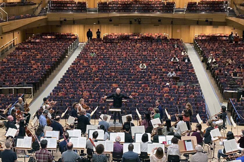 Music director Jaap van Zweden conducts the New York Philharmonic’s first rehearsal of the 2022-23 season at David Geffen Hall at Lincoln Center for the Performing Arts, on Sept. 19, 2022. Geffen Hall opens Oct. 8 following a $550 million renovation with the orchestra’s first concert there since March 10, 2020, the final performance before the pandemic shutdown. (AP Photo/Ronald Blum)