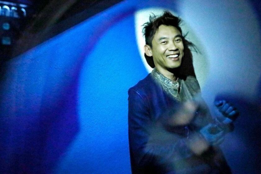 BURBANK, CA - NOVEMBER 15, 2018 - - Director James Wan dives deep into the blue for his latest film, "Aquaman." Wan, whose horror genre successes, "Insidious," and "The Conjuring," propelled him into the world of high level studio blockbusters like, "Furious 7," and now the DC Comics superhero Aquaman. Wan was photographed at his Atomic Monster offices on the Warner Bros. lot in Burbank on November 15, 2018. (Genaro Molina/Los Angeles Times) ATTENTION PRE-PRESS: PHOTO WAS GELLED FOR BLUE. PLEASE MAINTAIN BLUE CAST AND TONE.