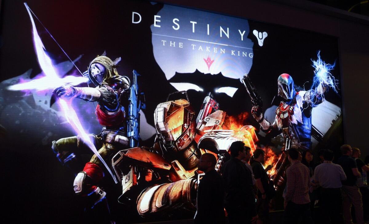 Attendees wait in line to play "Destiny: The Taken King" at E3 on June 16.