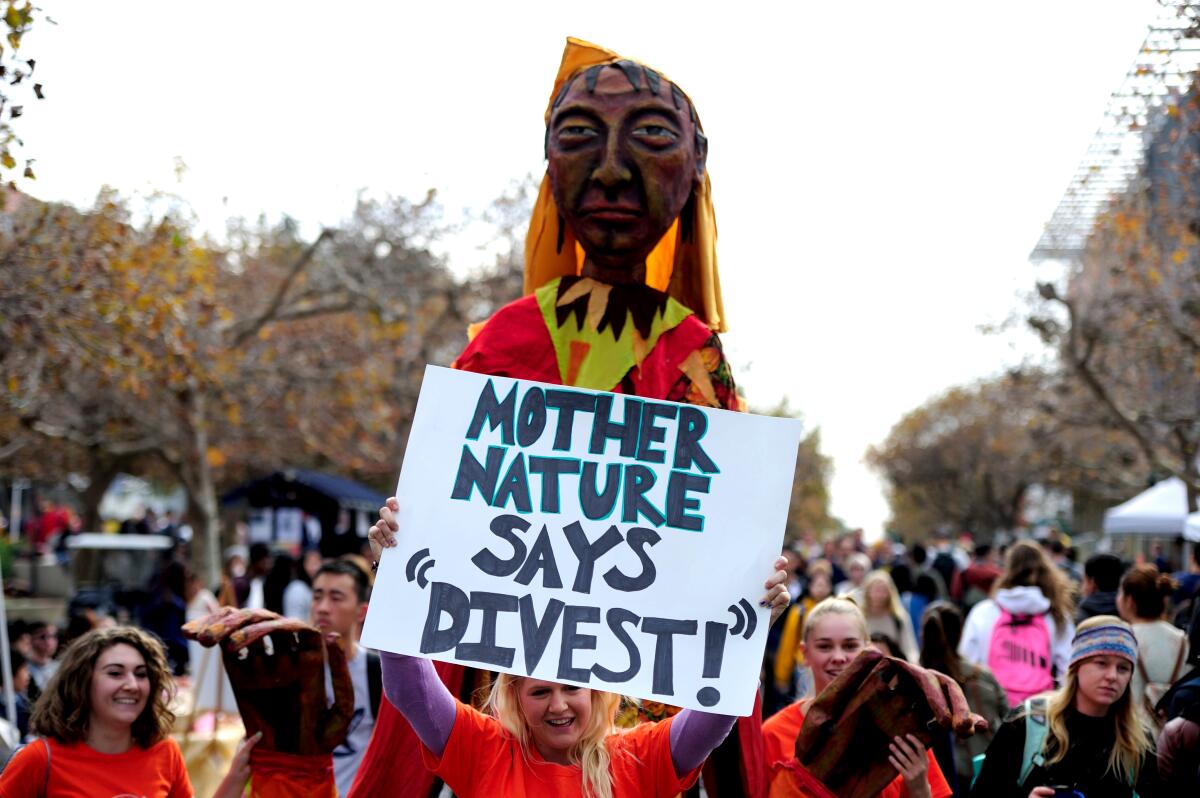 UC Berkeley students demonstrate in favor of fossil fuel divestment in 2014. 