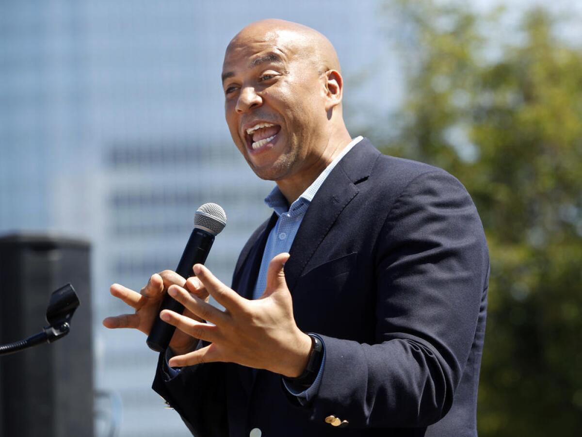 Democratic U.S. Sen. Cory Booker addresses a gathering during a naturalization ceremony at Liberty State Park in New Jersey. (Mel Evans / AP)