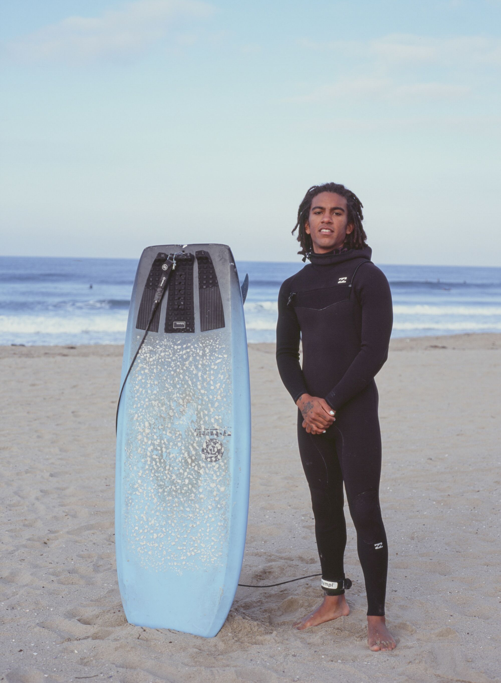 Gage Crismond poses a portrait before a morning surf session on Saturday, March 13, 2021.