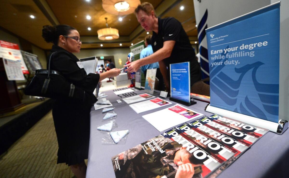California's unemployment rate declined to 8.5% in November, down from 8.7% in October, the state Employment Development Department reported Friday. Above, a job fair for veterans in Van Nuys on Oct. 24.