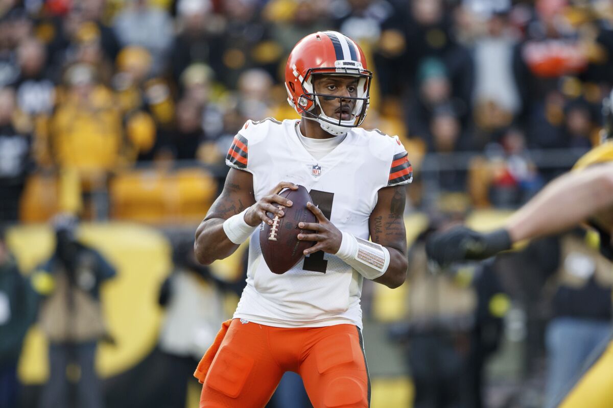 FILE -Cleveland Browns quarterback Deshaun Watson (4) looks to pass during an NFL football game, Sunday, Jan. 8, 2023, in Pittsburgh. The Houston Texans lost their pick in the fifth round of this year’s draft and must pay a $175,000 fine for a salary cap reporting violation involving Deshaun Watson, the NFL announced Thursday, March 9, 2023. (AP Photo/Matt Durisko, File)