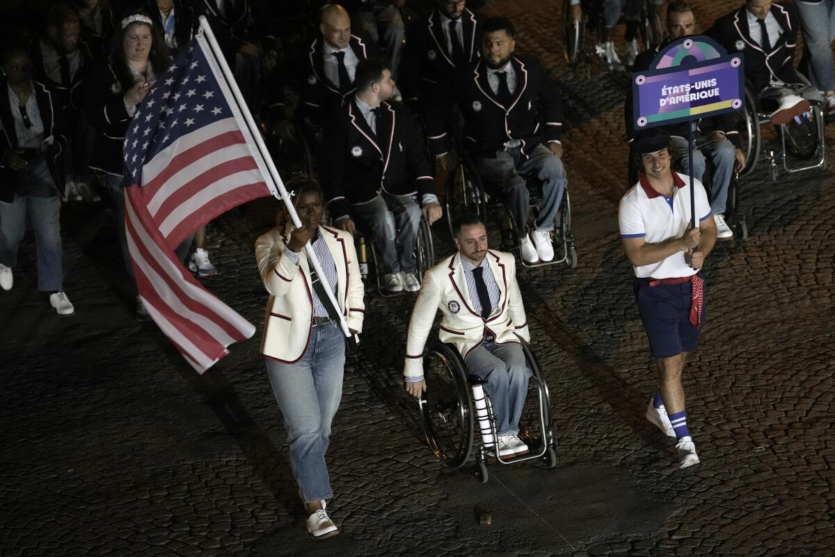 U.S. athletes takes part in the Paris Paralympic opening ceremony Wednesday.