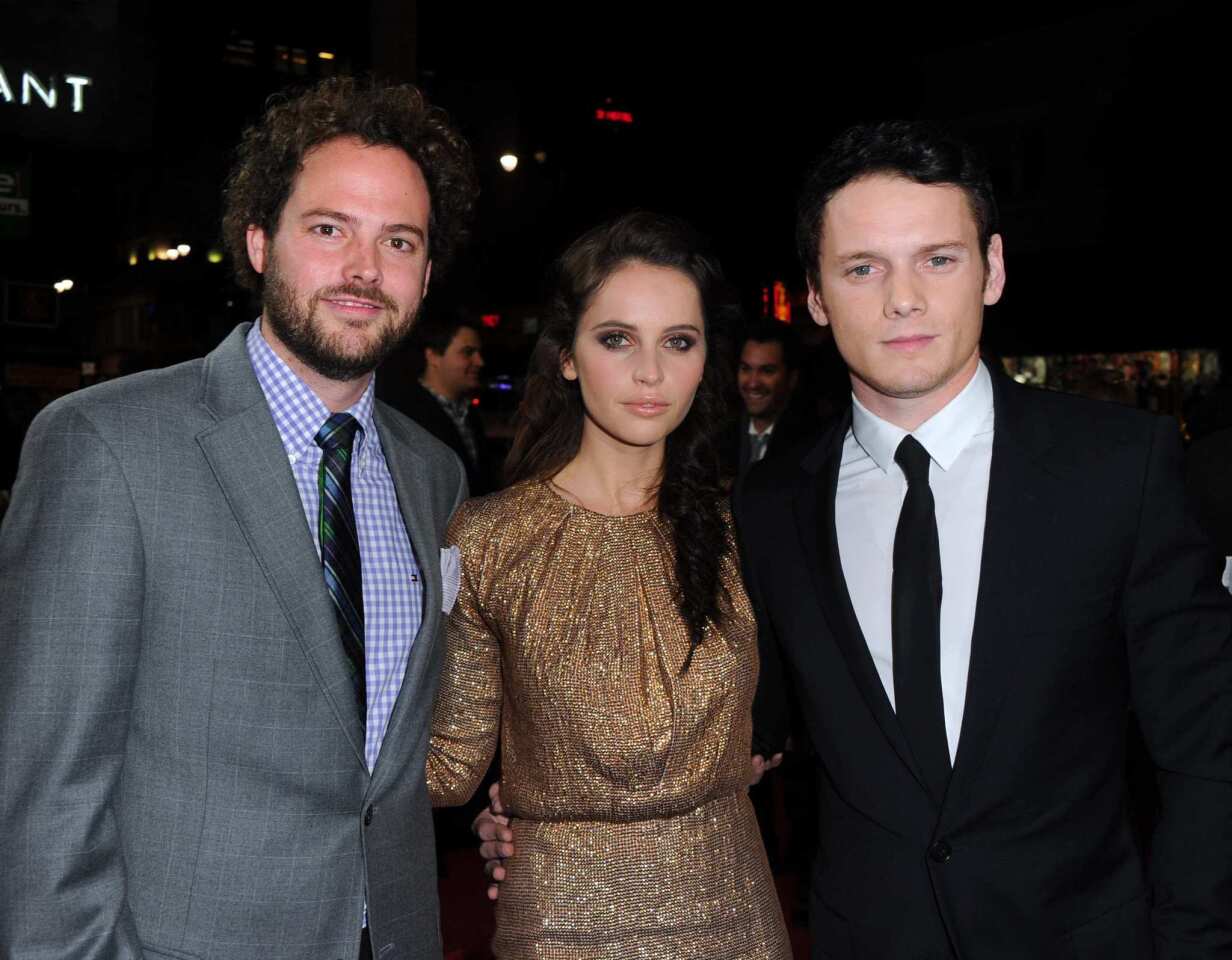 Writer-director Drake Doremus, left, with actors Felicity Jones and Anton Yelchin, at the premiere of Paramount Pictures' "Like Crazy" at the Egyptian Theatre in Hollywood. The story of a British college student and an American classmate falling in love, then being torn apart due to visa rules won the grand jury prize at Sundance.