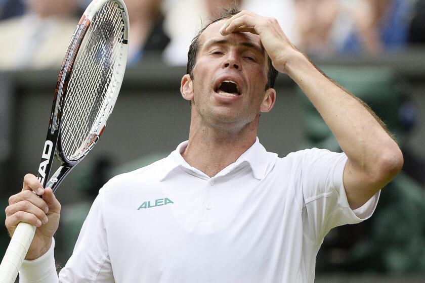 Radek Stepanek reacts during his second-round loss to Novak Djokovic at Wimbledon on Wednesday.