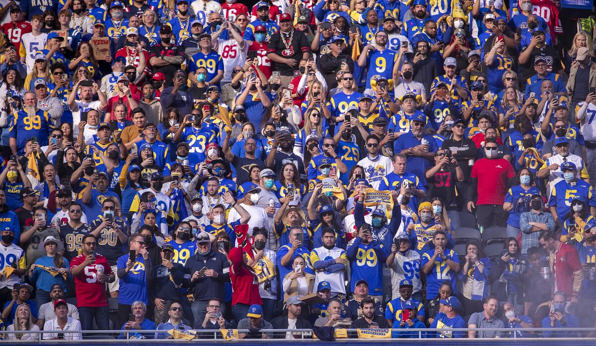 Rams and 49ers fans rally during the NFC Championships at SoFi Stadium on Sunday, Jan. 30, 2022 in Los Angeles, CA.