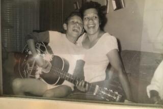 William "Bill" Virchis then 13, and his mother Margarita in 1957 when she bought his first guitar on Mother's day.