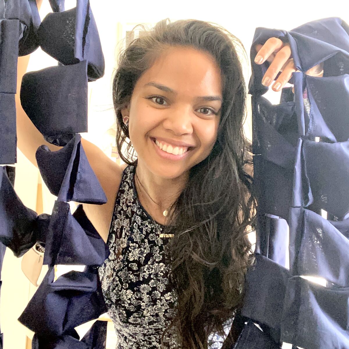 San Diego fashion designer Leizl Totaram with her handmade face masks