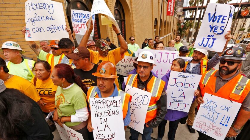 Supporters of Measure JJJ, which Los Angeles voters approved in November. They say Measure S, on the March ballot, could effectively undo many of JJJ's provisions.