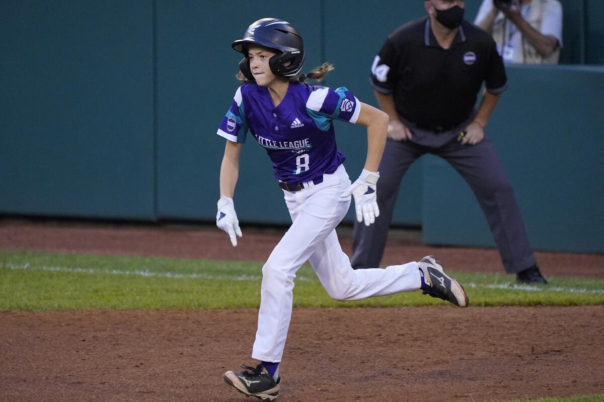 Ella Bruning steals second base against Washington.