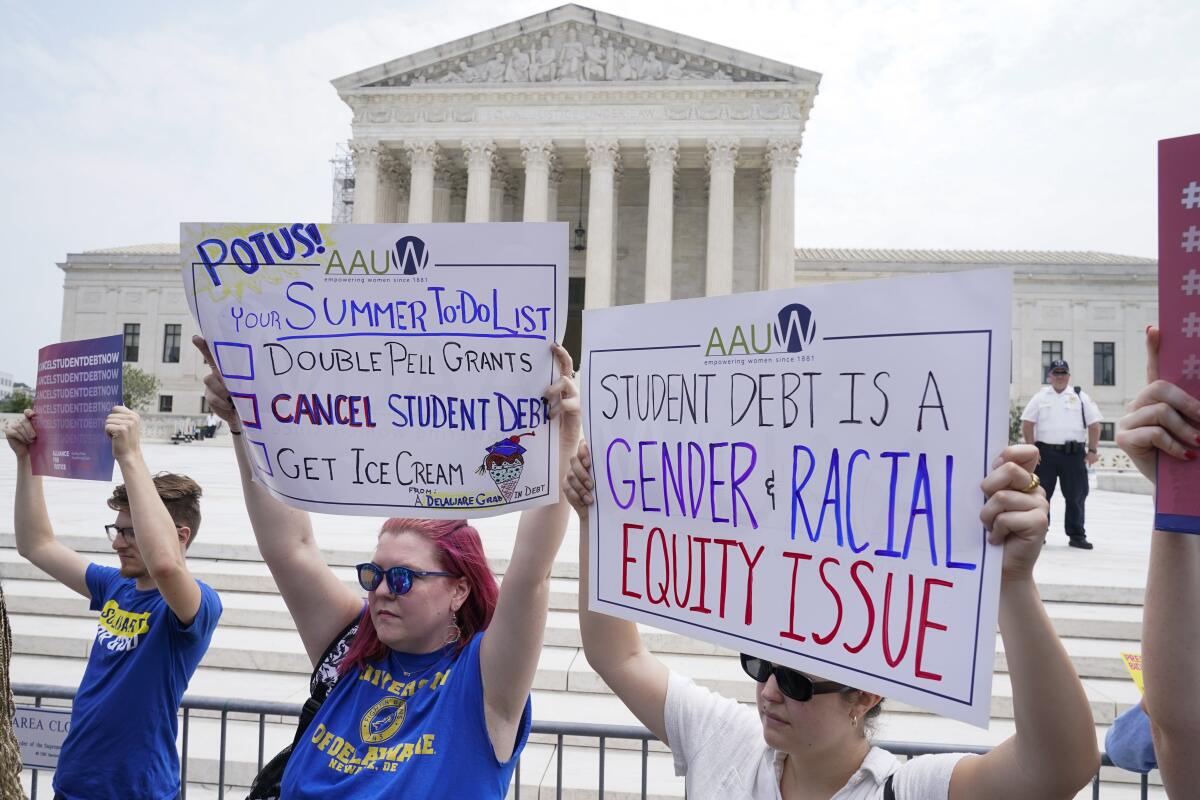 People demonstrate outside the Supreme Court in Washington on June 30. 