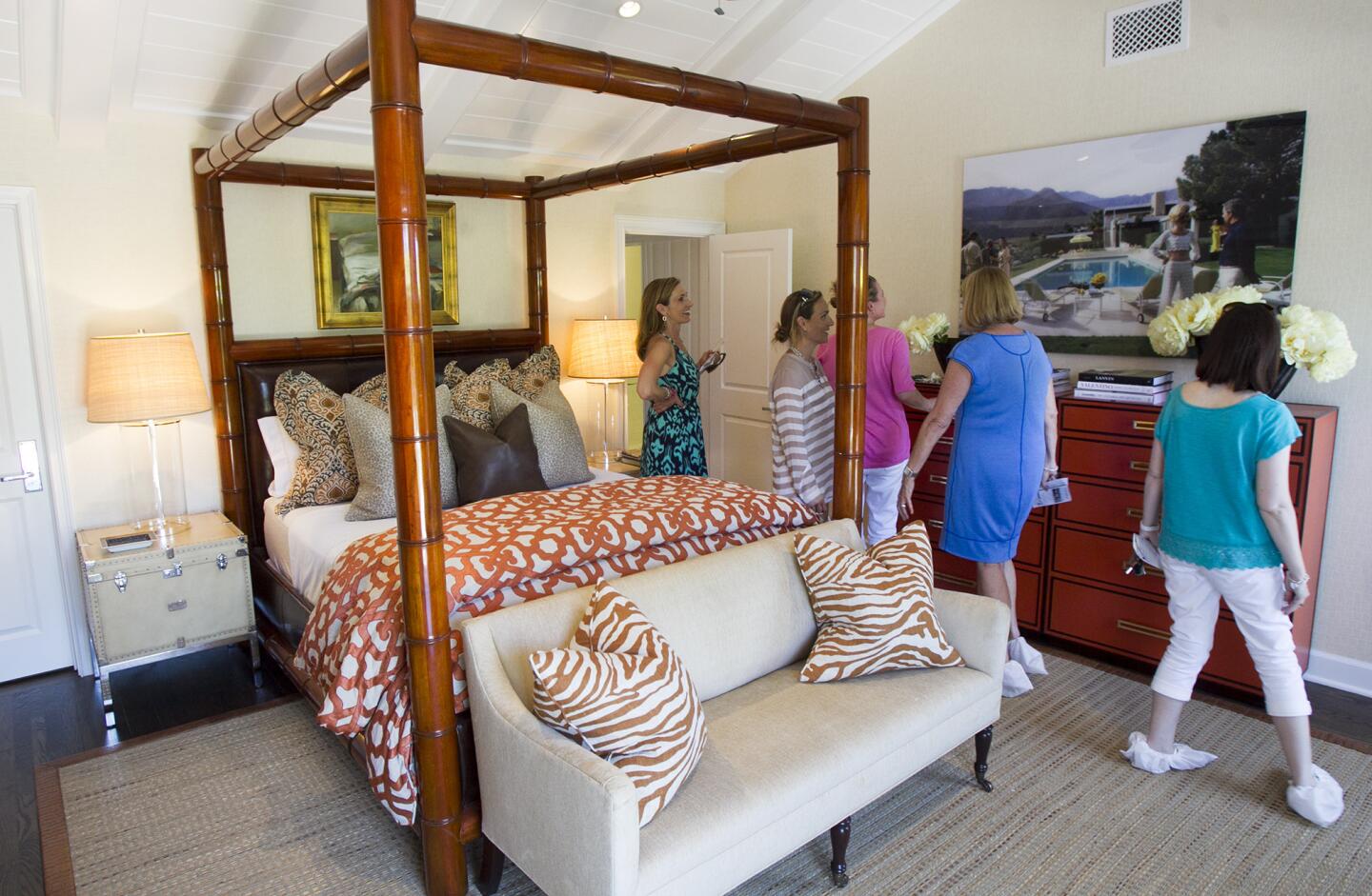 Guests tour the master bedroom at the Butera Residence on 700 East 15th Street on Thursday, May 15. (Scott Smeltzer - Daily Pilot)