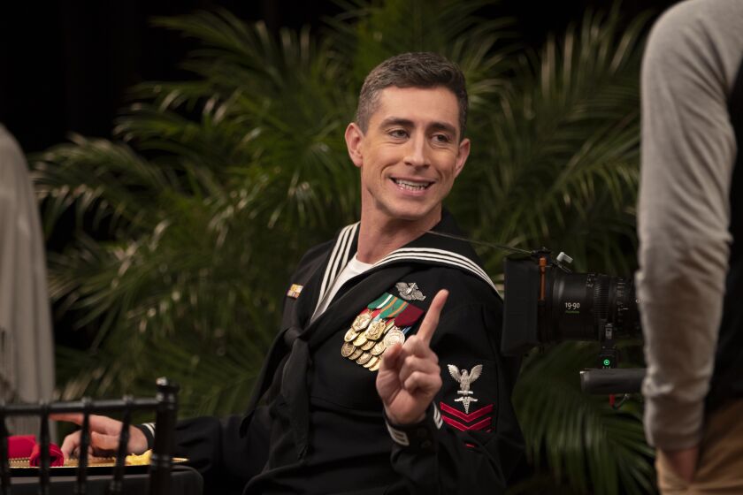 RIVERSIDE CA - DECEMBER 7, 2019: Donny O'Malley, a former Marine and the founder of VET TV, on set during the filming of the Marine Corps Ball for an episode of Devil Docs on December 7, 2019 in Riverside, California. VET TV is a streaming on-demand video subscription which produces film and TV by, for and about veterans.(Gina Ferazzi / Los Angeles Times)
