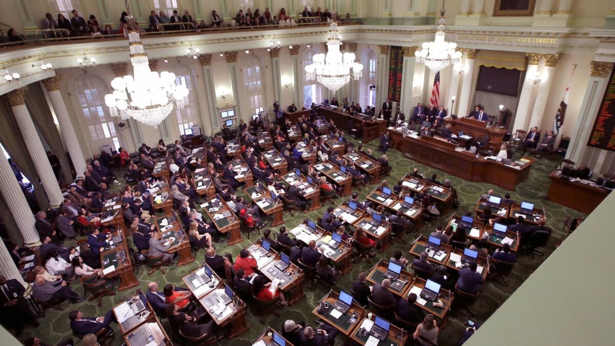 Members of the California Assembly convene during the legislative session in December.