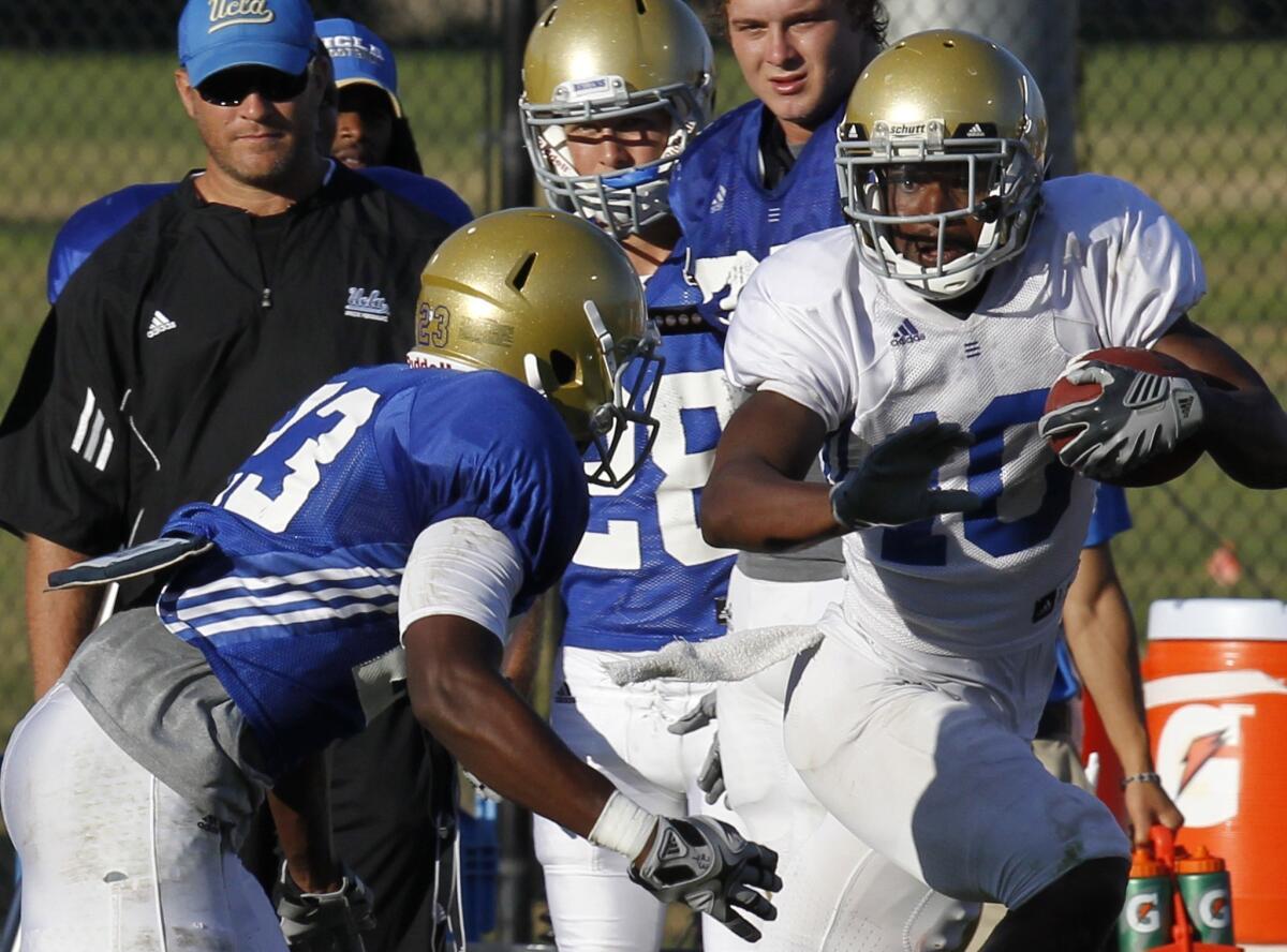 Former UCLA receiver Ricky Marvray, shown during the Bruins' fall scrimmage in 2011, will graduate this spring.