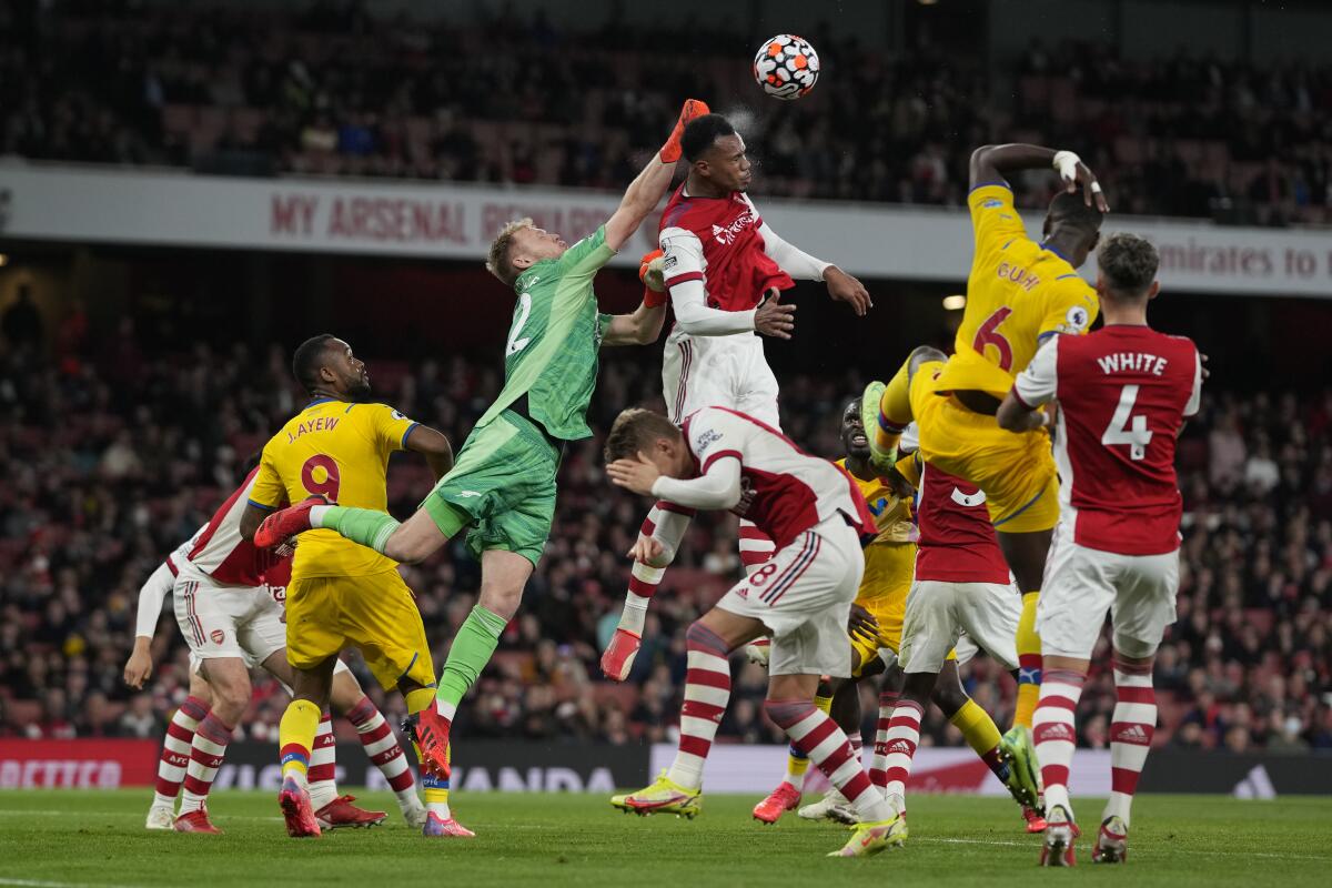 Arsenal's goalkeeper Aaron Ramsdale punches clear 