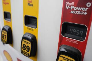 Gas prices are seen at a gas station in Buffalo Grove, Ill., Tuesday, April 23, 2024. (AP Photo/Nam Y. Huh)