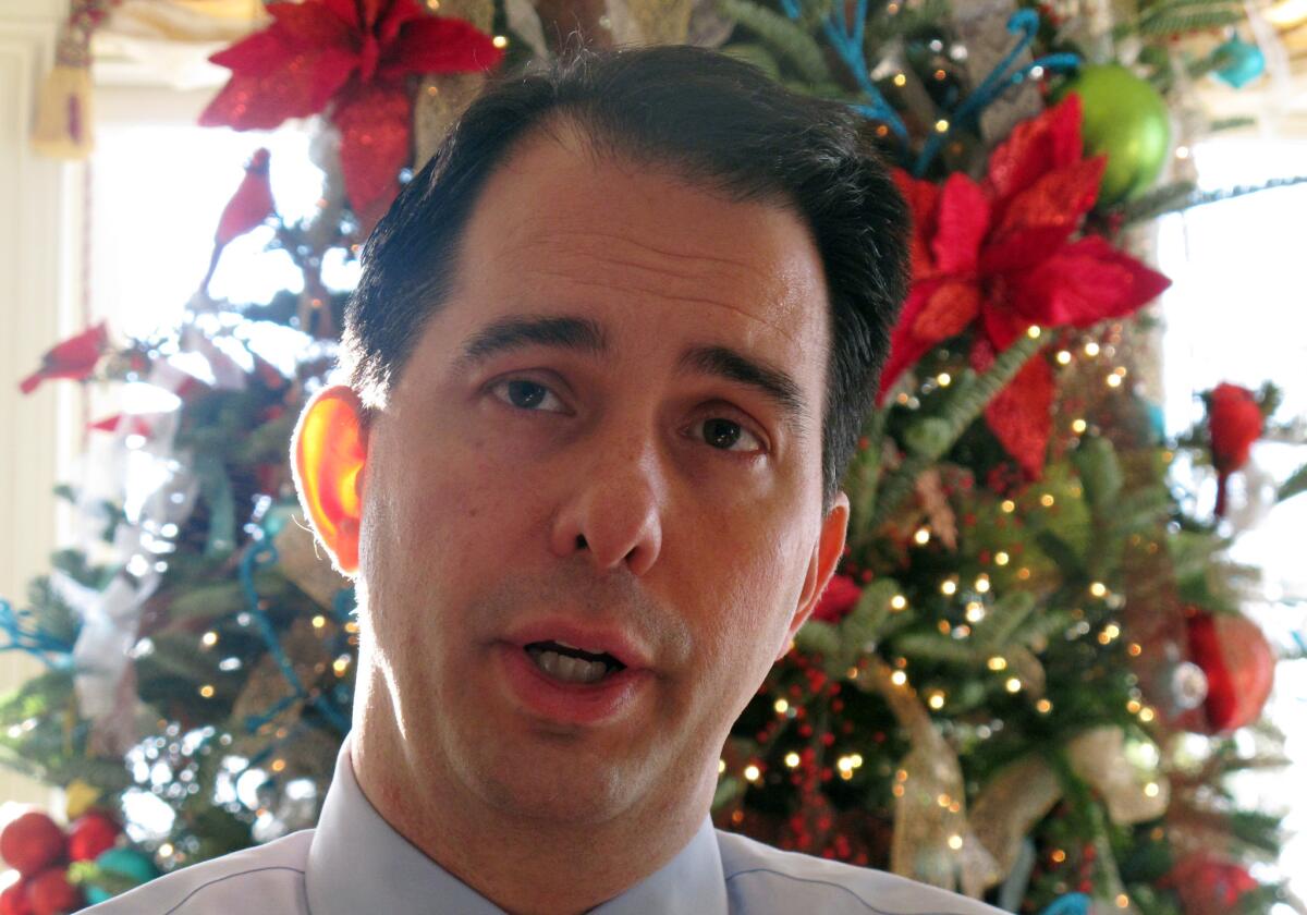 Wisconsin Gov. Scott Walker this week at his home in Maple Bluff, Wis. Walker has quietly signed a bill that will make it harder to force public schools to drop tribal nicknames.