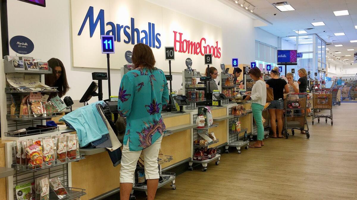 Shoppers pay for their purchases at a Marshalls and Home Goods store in Phoenix in May.