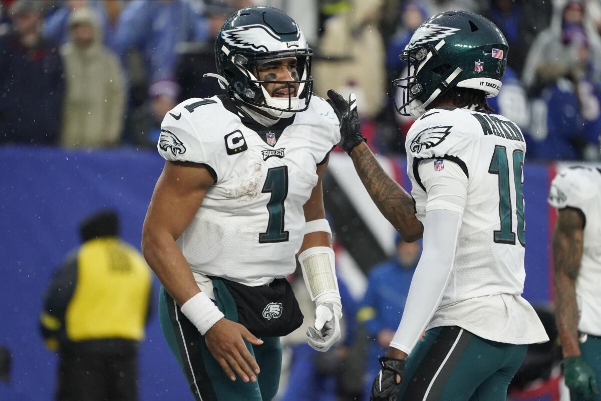 Jalen Hurts, Eagles secure playoff spot, thump rival Giants 48-22