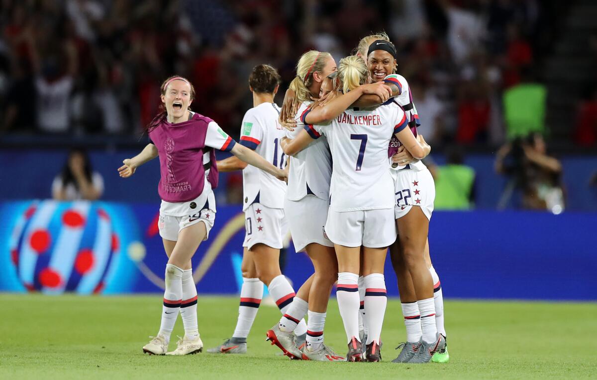 U.S. players celebrate after their 2-1 victory over France.