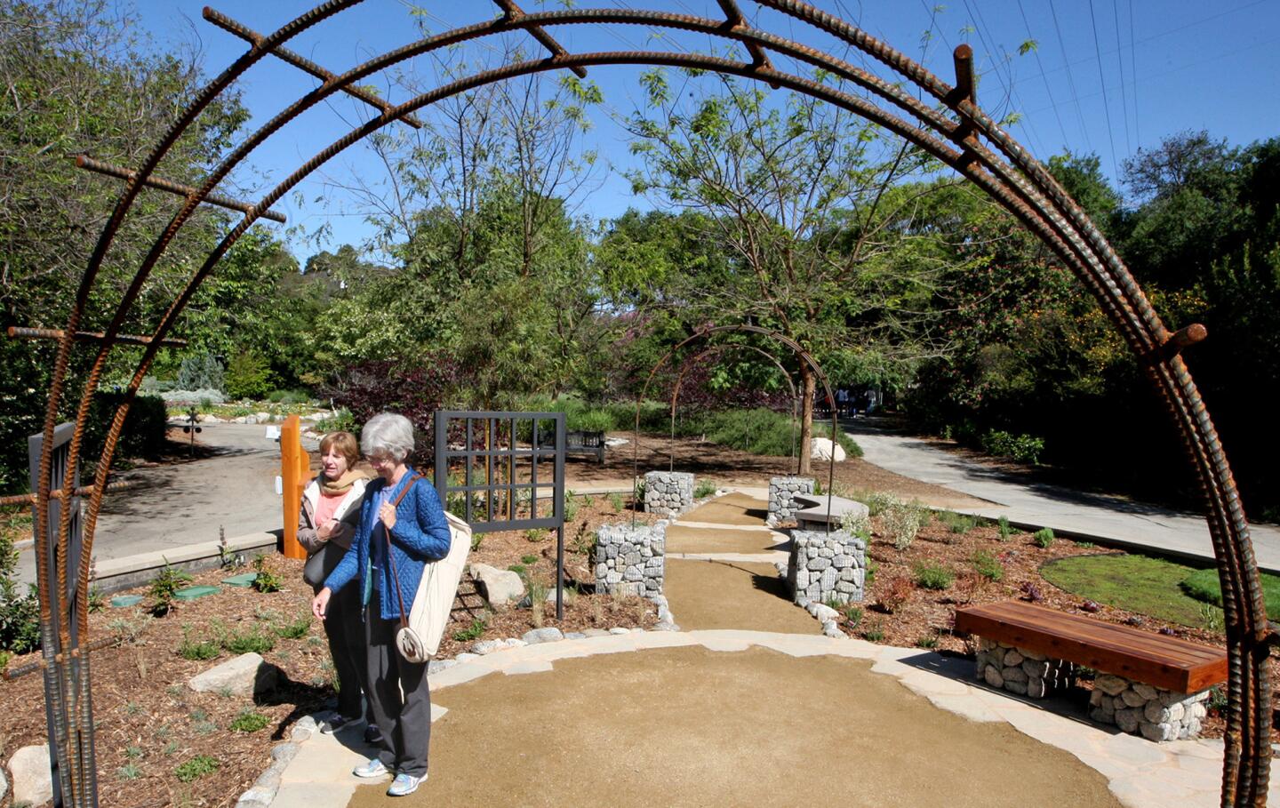 La Cañada Flintridge residents Kathryn Hill and Judy Trumbo take a look at Descanso Gardens' "low-water," demonstration garden during a press preview on Wednesday, April 8, 2015.