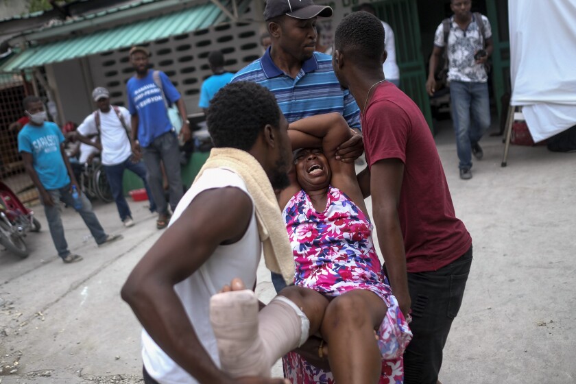 Residents stay outside their homes amid the fear of aftershocks in Saint-Louis-du-Sud,Haiti
