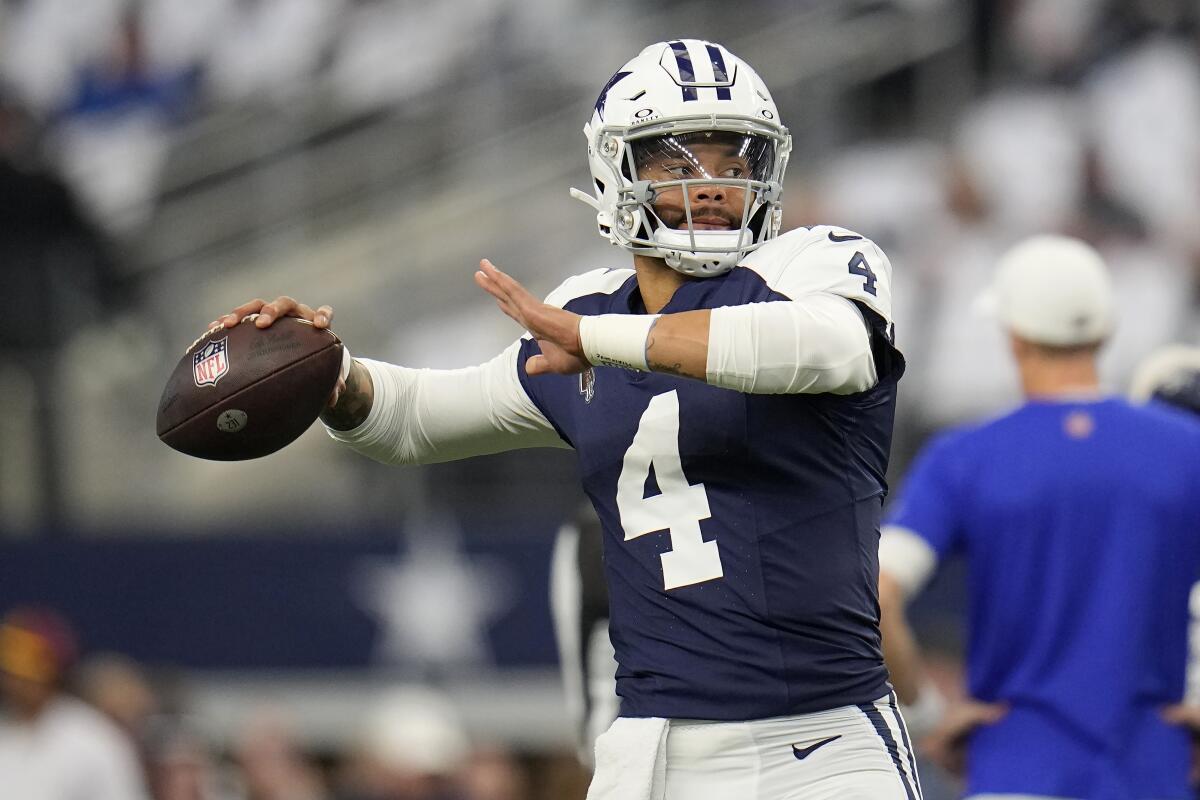 Cowboys face Seahawks with 13-game home winning streak on the line