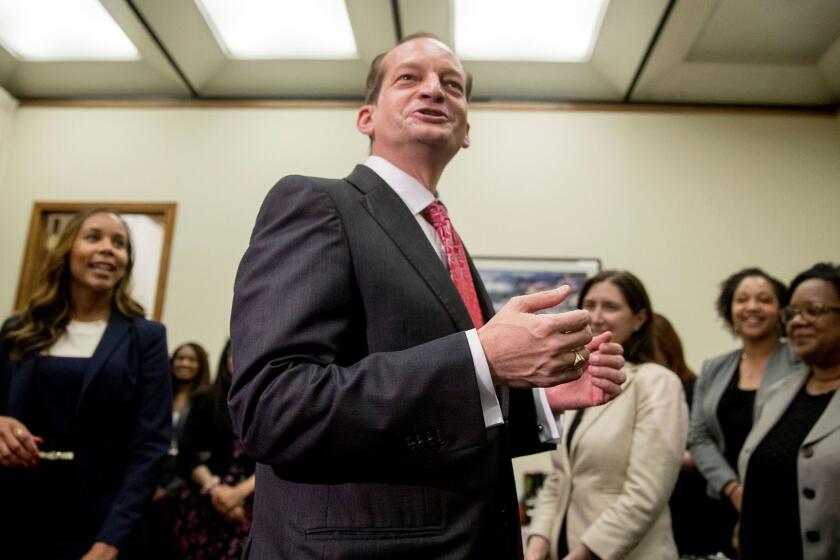 Newly sworn-in Labor Secretary Alexander Acosta greets employees at the Labor Department in Washington, Friday, April 28, 2017. (AP Photo/Andrew Harnik)