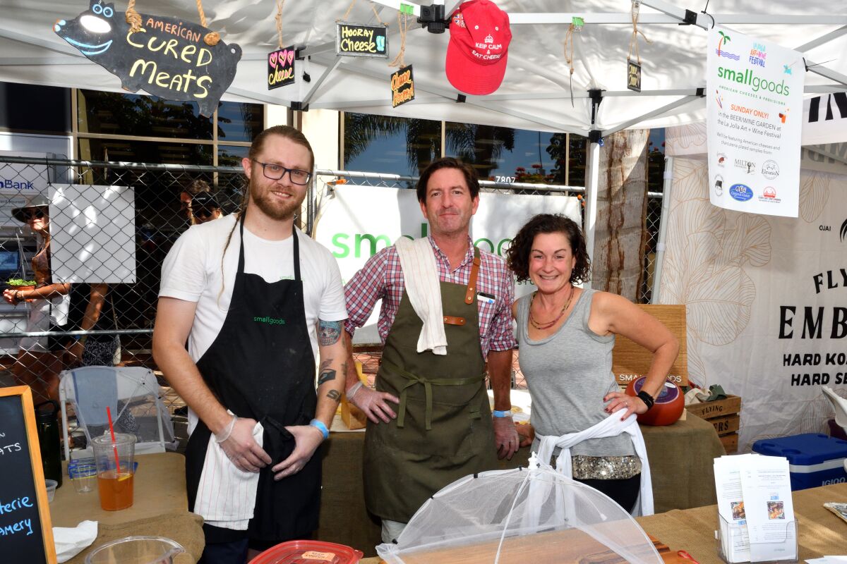 Devon Daines and Mike and Jenny Eastwood of Smallgoods work the 2021 La Jolla Art & Wine Festival.