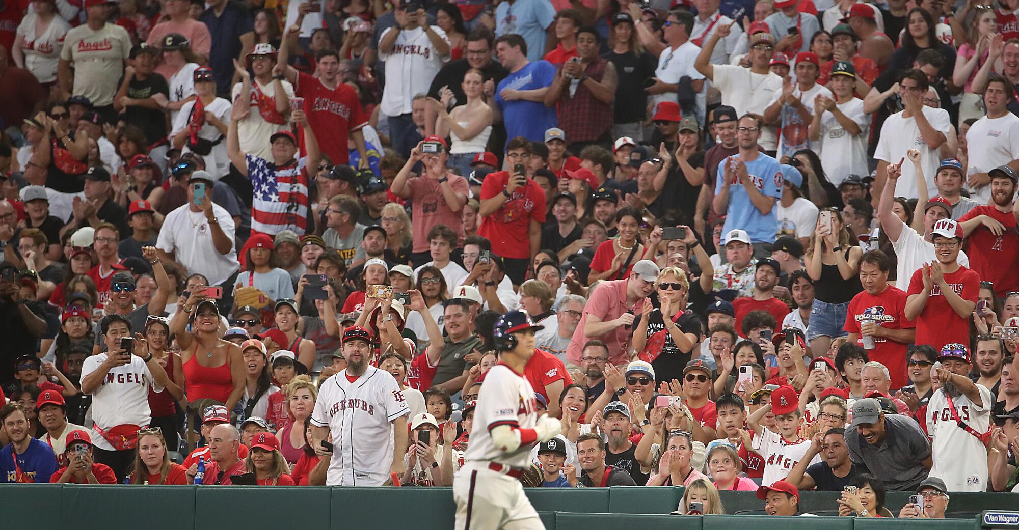Fans cheer as they get a close-up view of Angels two-star Shohei Ohtani