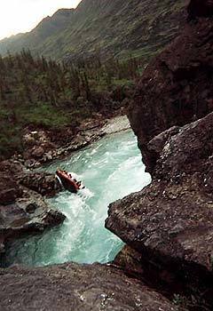 The raft with six occupants tips over in the Snake River's "second-to-last" rapids.