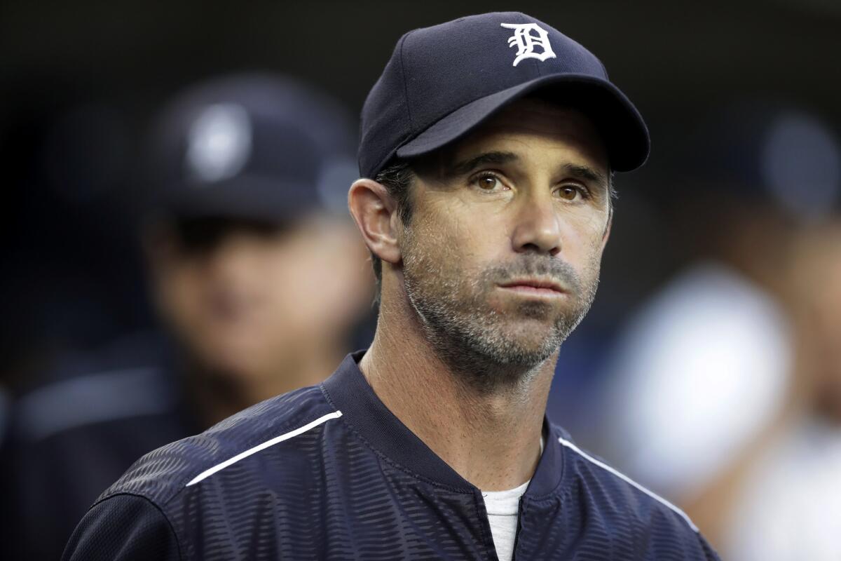 Detroit Tigers manager Brad Ausmus appears in the dugout before a baseball game against the Minnesota Twins, in Detroit. Ausmus has been named the Los Angeles Angels’ manager. General manager Billy Eppler on Sunday, Oct. 21, 2018, announced the hiring of Ausmus, who served as his special assistant last season.