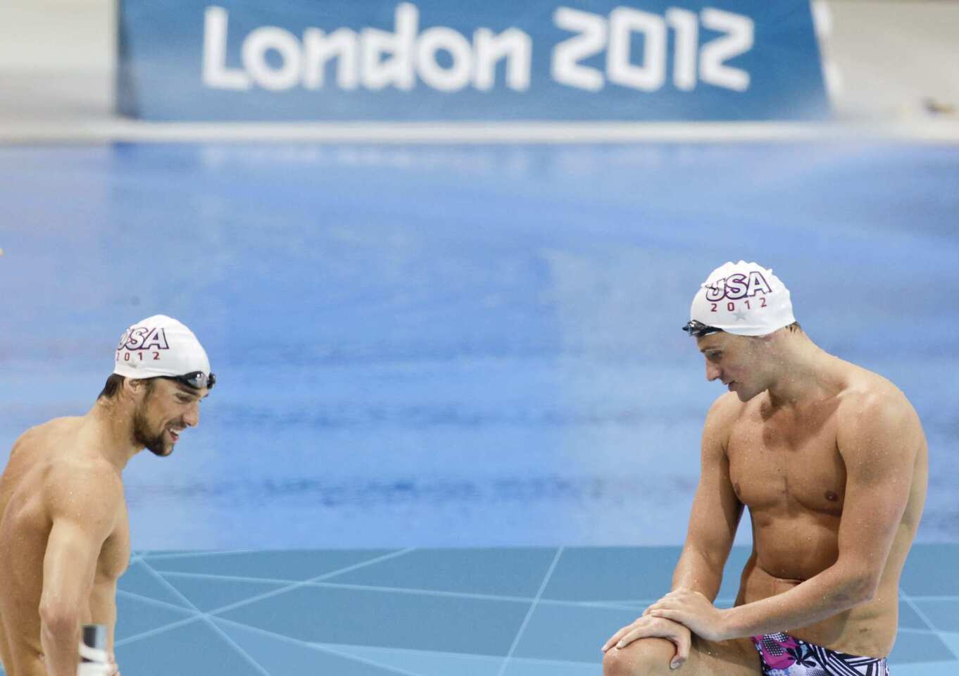 United States swimmers Michael Phelps, left, and Ryan Lochte are seen during a training session at the Olympic Aquatics Center in London.