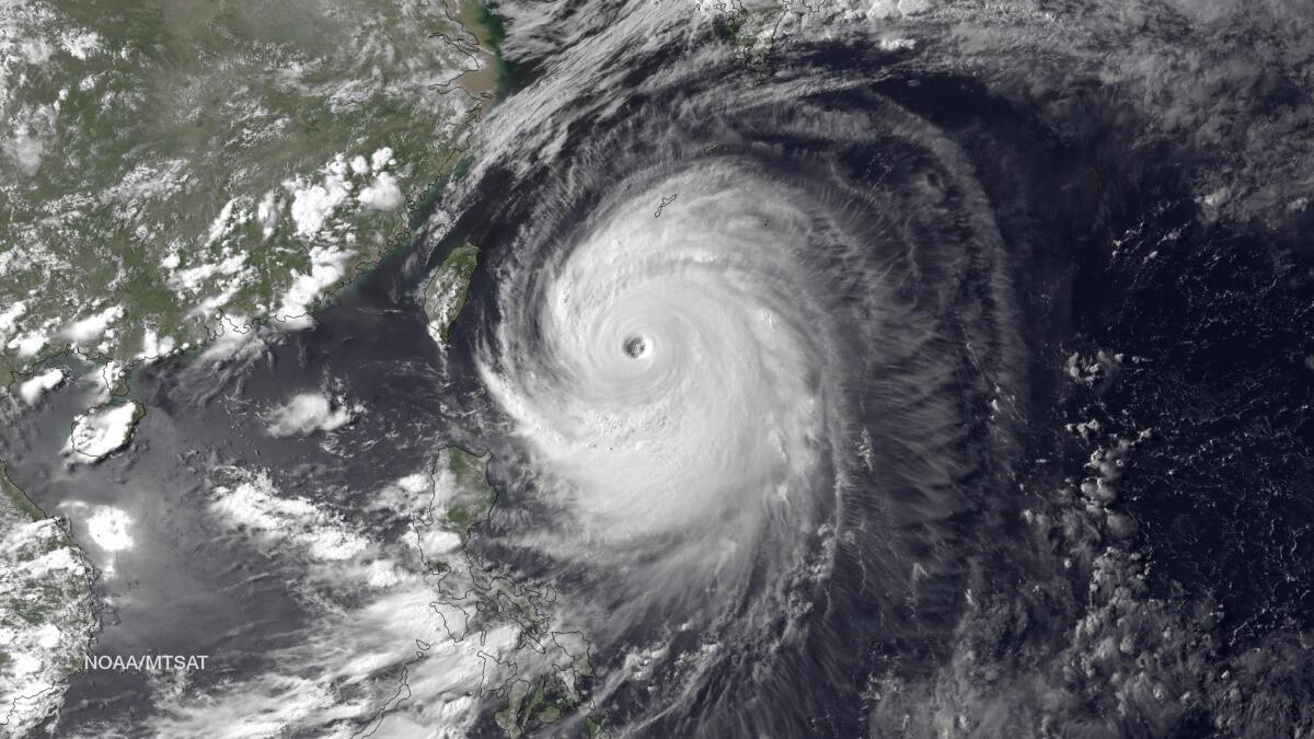 A satellite image from the National Oceanic and Atmospheric Administration showing typhoon Neoguri bearing down on Okinawa.