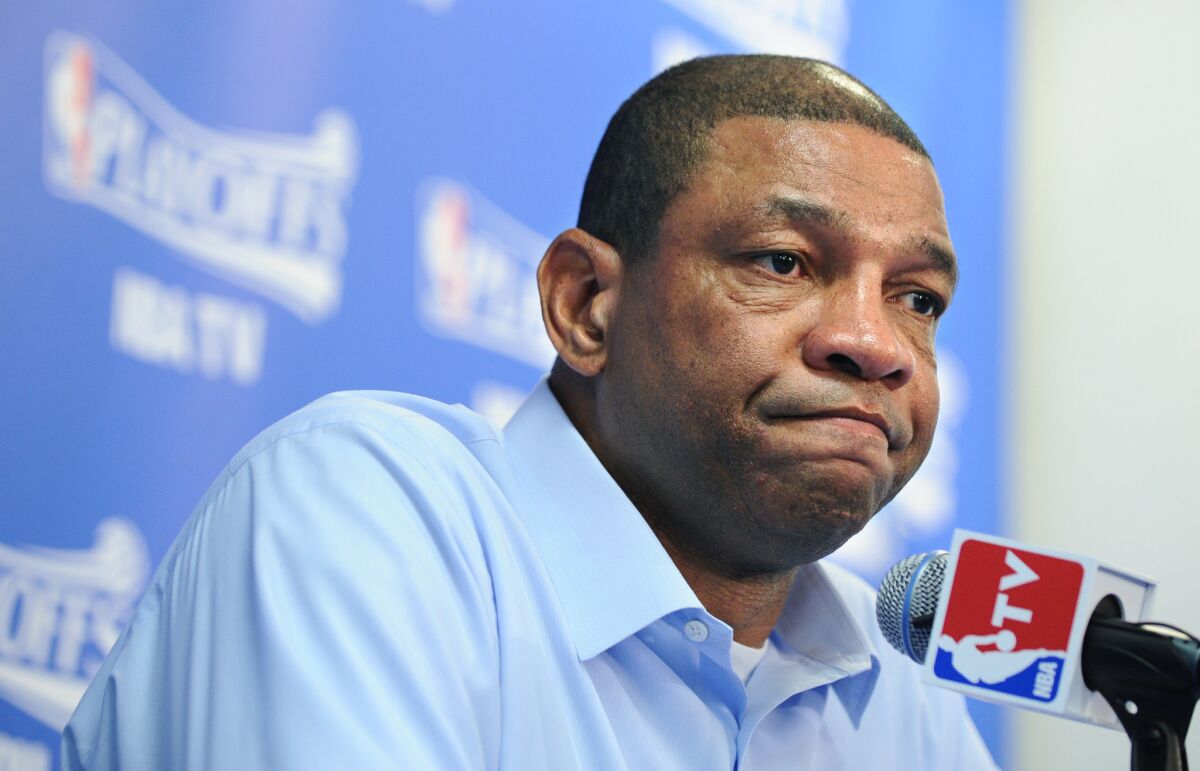 Clippers Coach Doc Rivers said Monday that he believes team owner Donald Sterling was the person making racial comments on an audio recording released by TMZ over the weekend. Above, Rivers before Sunday's Clippers game.