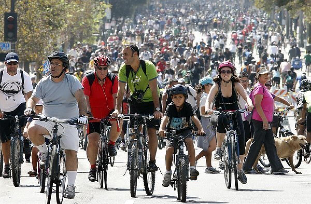 Thousands of bicyclists last October in downtown Los Angeles, where the CicLAvia is an annual event. Now the idea has spread to San Diego.