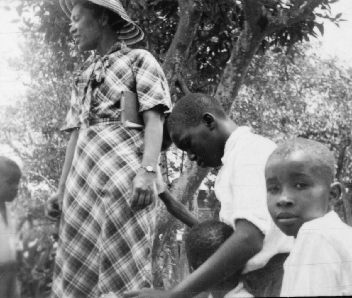 Hurston plays with children in her hometown of Eatonville, Fla., during a recording expedition in June 1935.