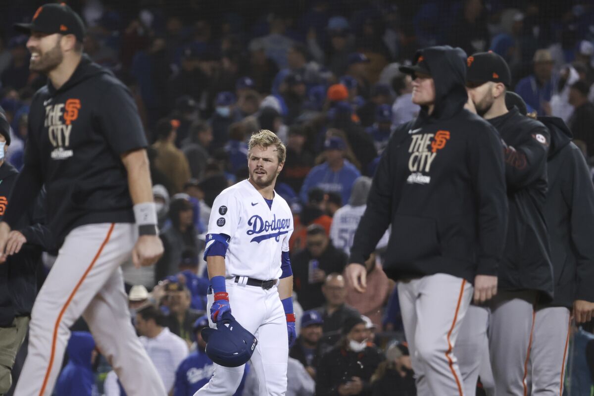 Dodgers batter Gavin Lux reacts after flying out to end the game on Monday.