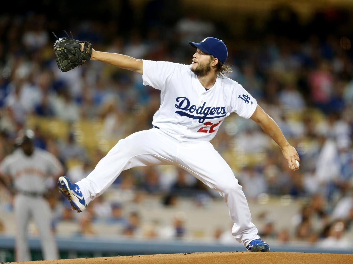 Dodgers starting pitcher Clayton Kershaw (22) delivers a pitch in the first inning against the San Francisco Giants.