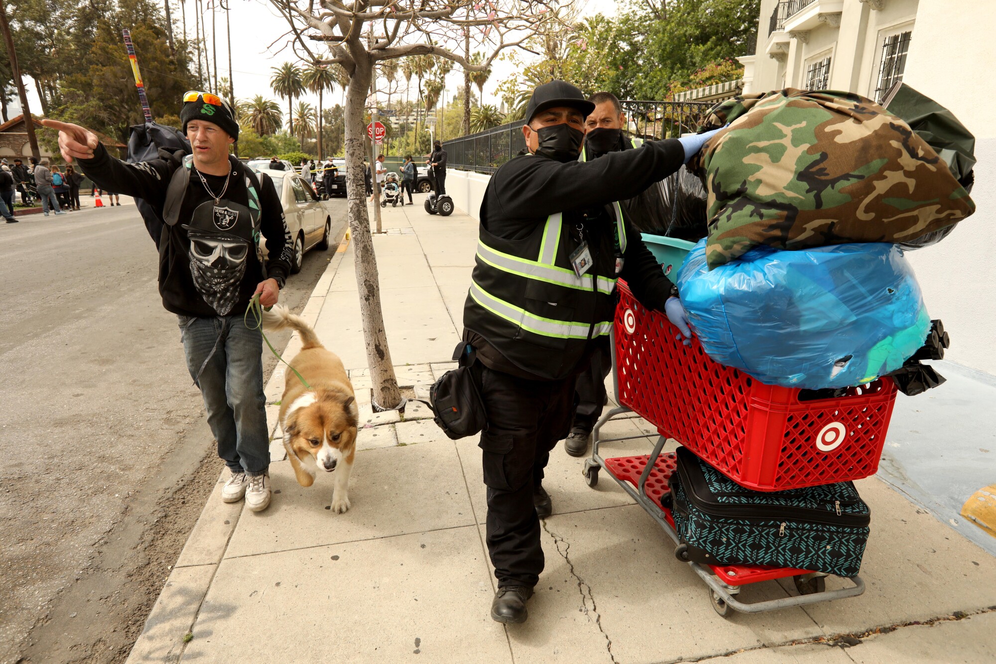 Members of Urban Alchemy helped Jason Reynolds with his belongings, after they were evicted from Echo Park 